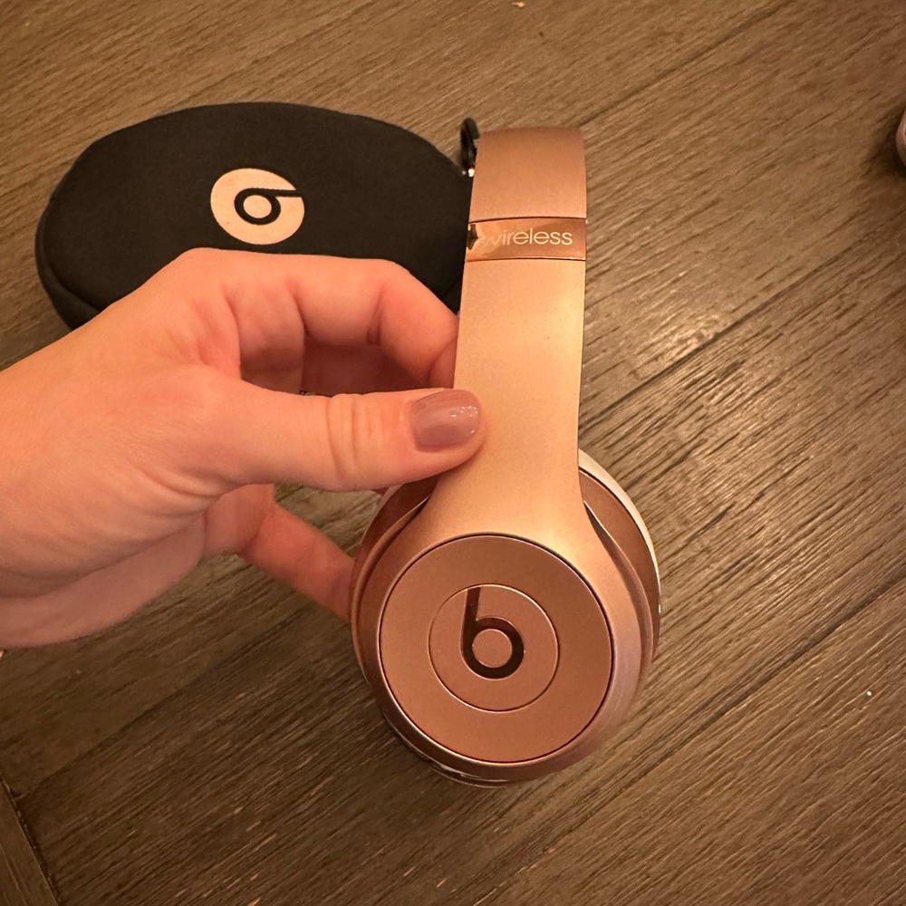 Beats by Dre Rose Gold Over-Ear Headphones. Does not come with charger.